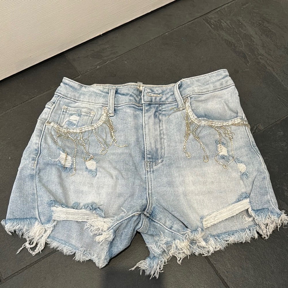 Blue High-Waisted Jean Shorts with Distressed Details